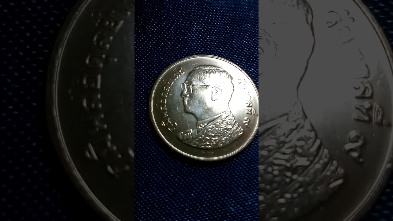 เหรียญ 1 บาทพ.ศ.2559 เป็นเหรียญแบบใหนราคา3000