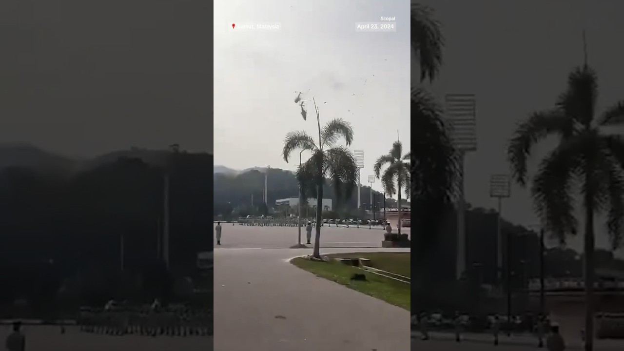 Two Malaysian military helicopters collided and crashed during a training session. Two Malaysian military helicopters collided and crashed during a training session.