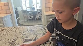 7-year-old converts exponents into caret notation, then solves (First Lesson, Second Practice Set)
