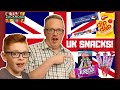 Americans Try UK Snacks For The First Time!! | ZacknDad