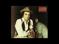 Footlights by Merle Haggard from his album Serving 190 Proof