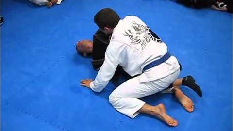 side control: escape to half guard