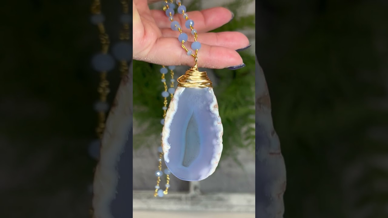 Agate slice pendant with chalcedony bead chain.