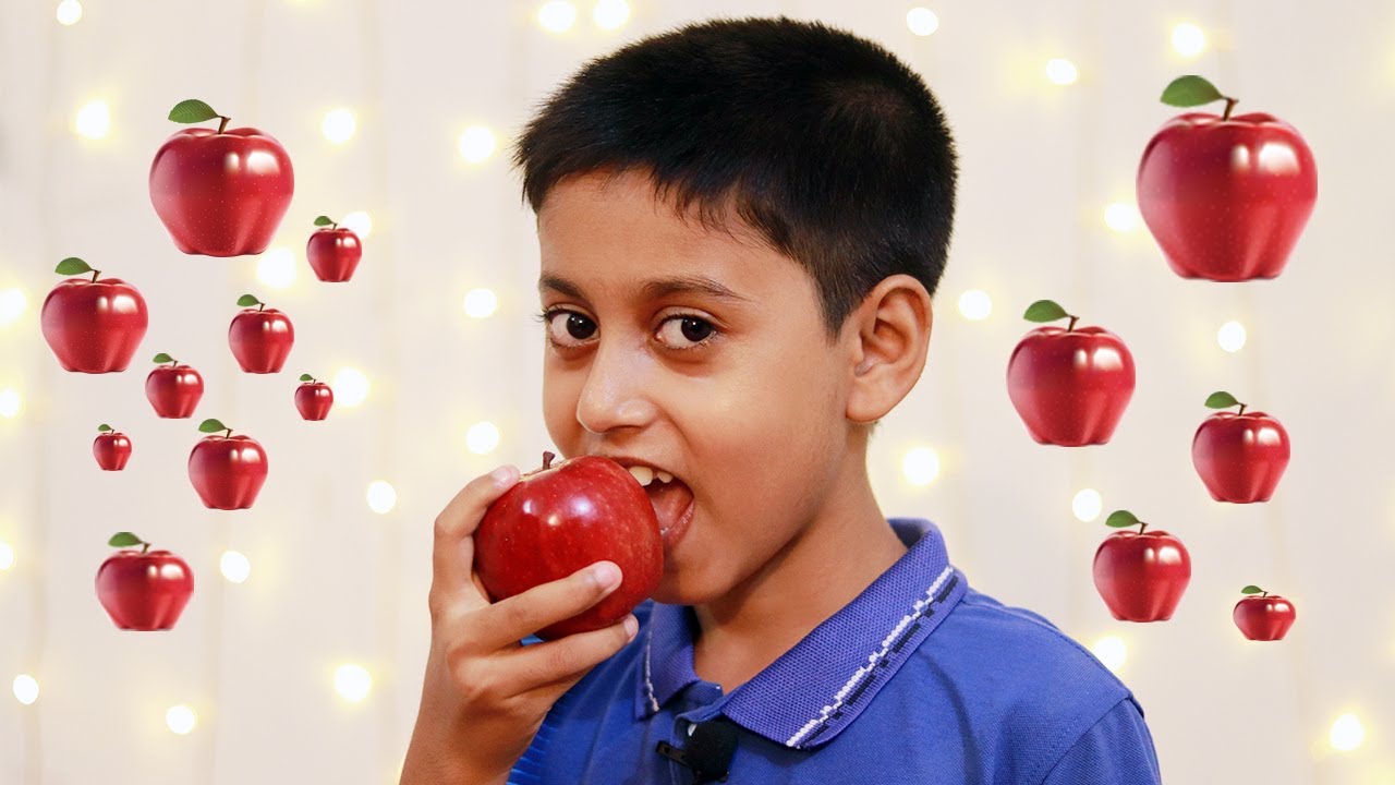 Kids eating Apples. Kids Challenge. Oliver eats an Apple.