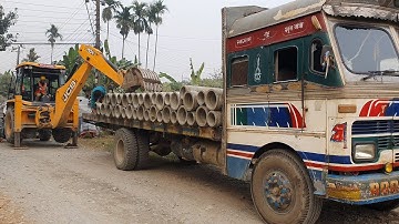 JCB Backhoe Loader Unloading Culvert Pipe From Low Bed Truck - JCB Video - Part 3