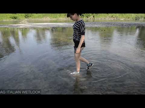 Wetlook - Laura in river with sneakers