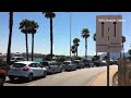 Cars ease past the Rock of Gibraltar to and from the Spanish border. Some say new Spanish border che