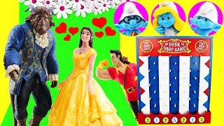 Smurfs & Beauty and The Beast Movie Disk Drop Game! Belle, Smurfette & Gaston open Toy Surprises! Smurfs & Beauty and The Beast Movie Disk Drop Game! Belle, Smurfette & Gaston open Toy Surprises!