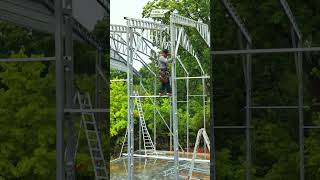 Installing steel trusses for a 50x100 commercial metal building—precision fabrication and installati