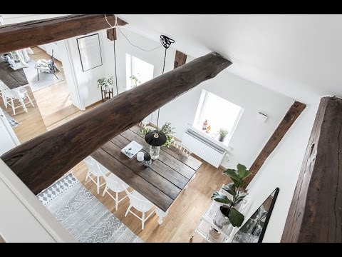 Video: Wood Accents Uplift Black & White Scandinavian Apartment