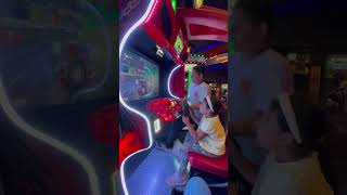 Salma playing car racing video game screenshot 4