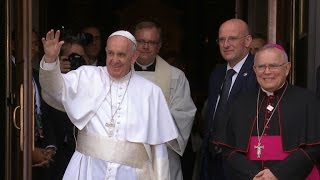 Pope Francis arrives for Mass at Philadelphia cathedral