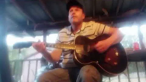 Anthony picking and singing