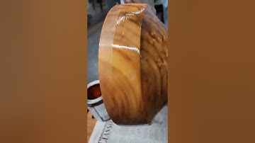 How to apply polyurethane to a wooden bowl using a foam brush.