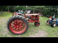 Servicing antique tractor for parade