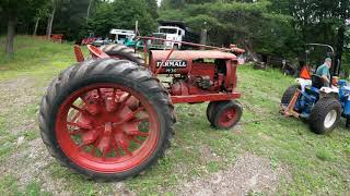 Servicing antique tractor for parade