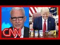 Cooper: Trump poses with can of beans while Covid-19 surges