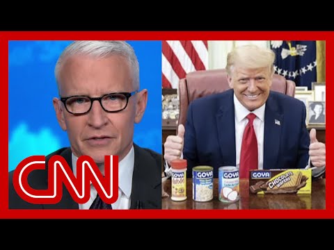 Cooper: Trump poses with can of beans while Covid-19 surges