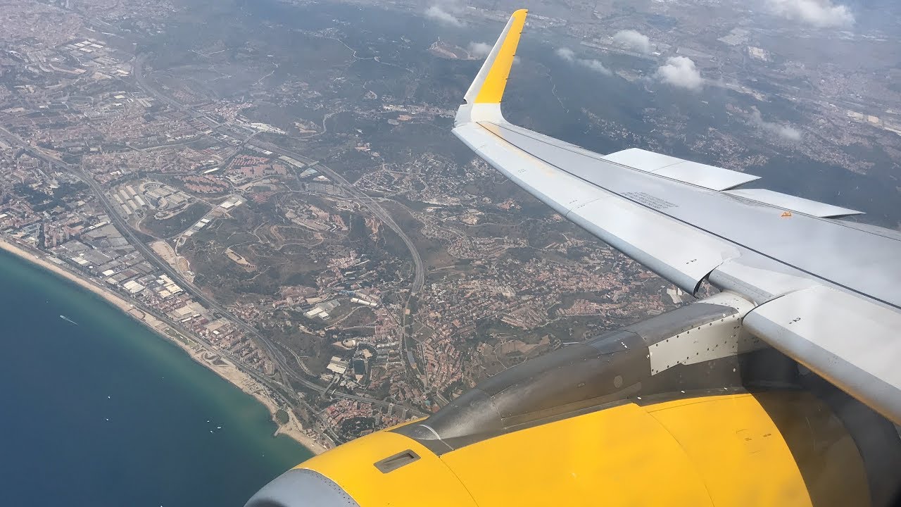 CITY VIEWS Vueling A320 Landing at Barcelona ElPrat Airport YouTube