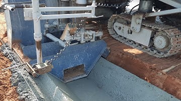 Máy rải bê tông rãnh doc