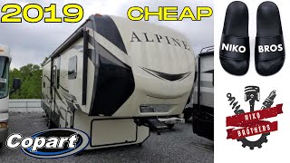 We Check Out a Wrecked 2019 Alpine Camper at Copart