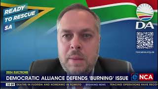 DA defends 'burning flag' TV ad