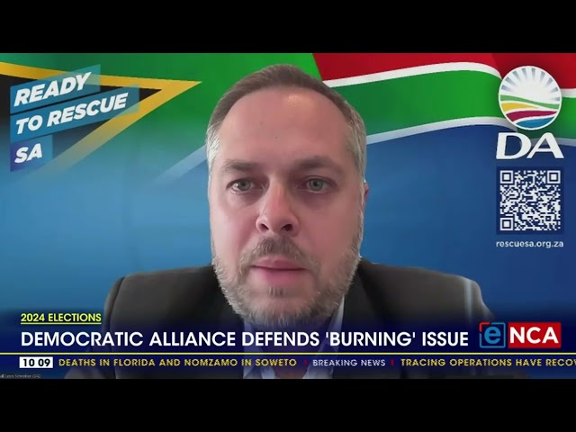 DA defends 'burning flag' TV ad class=