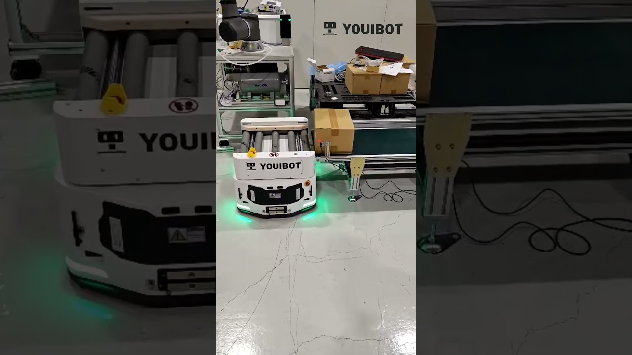 Youibot Product I The B300 AMR seamlessly integrated with rollers for conveyor docking
