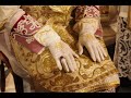 The vesting of the Bishop for the Pontifical Mass