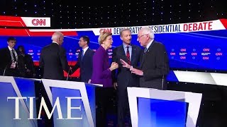 Famous Bernie Sanders And Elizabeth Warren Share An Awkward Post-Debate Moment | TIME Wealth
