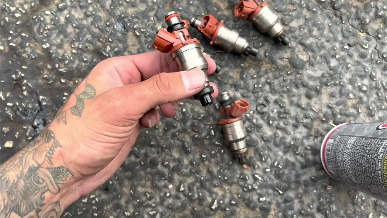 How to install Fuel Injectors Mazda 323 - YouTube