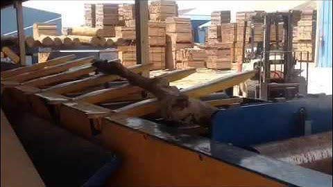 Baker Dominator Band Sawmill & reverse edger in action