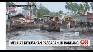 melihat kerusakan pascabanjir bandang