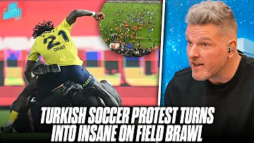 Turkish Soccer Player Hit CLEAN Spinning Heel Kick On Protester That Rushed Field | Pat McAfee