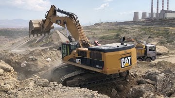 Caterpillar 385C Excavator Loading Trucks And Caterpillar 773D Dumper - Kivos Ate