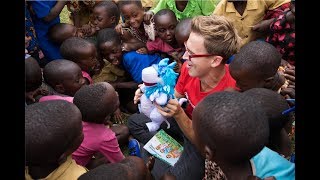 The Christmasaurus and I visit Rwanda with Save the Children.