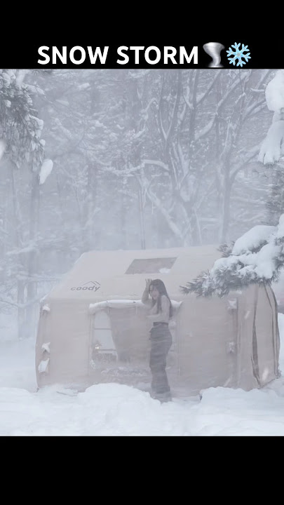 INFLATABLE TENT CAMPING IN A SNOW STORM.