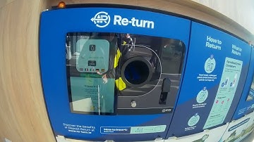 Blind customer using RVM reverse vending machine at Lidl, Edward Street, Tralee (26.02.2024).