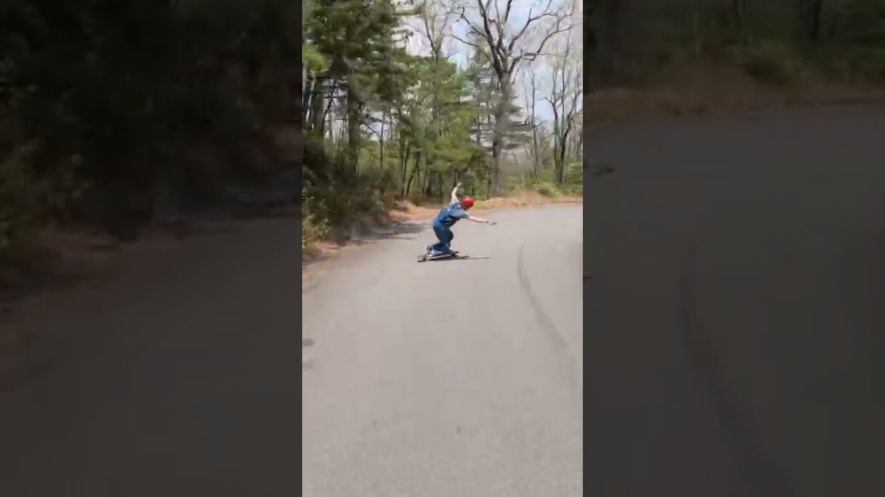Surfin powerslides down a big one. 