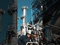 Industrial Engineer Inspecting Equipment at a Modern Processing Plant