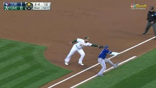 TOR@OAK: Alonso tags out Bautista at first