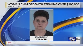 Woman accused of stealing over $100K