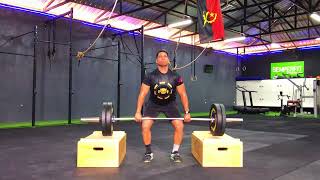 Squat clean from blocks above knees
