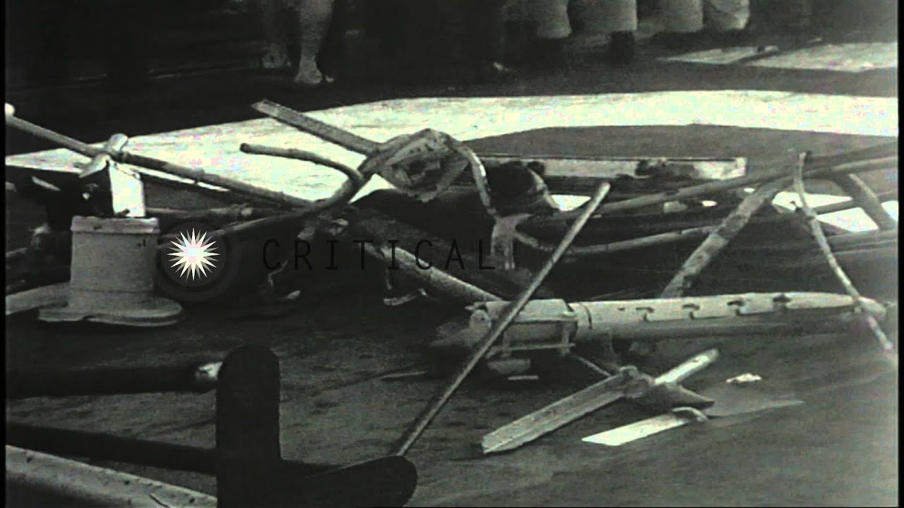 Life rafts are hoisted aboard Royal Australian Navy HMAS Melbourne (R-21) in the ...HD Stock Footage