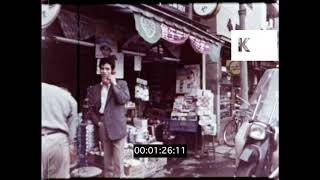 1960s Japan, POV Past Row of Shop Stalls, Locals, 16mm