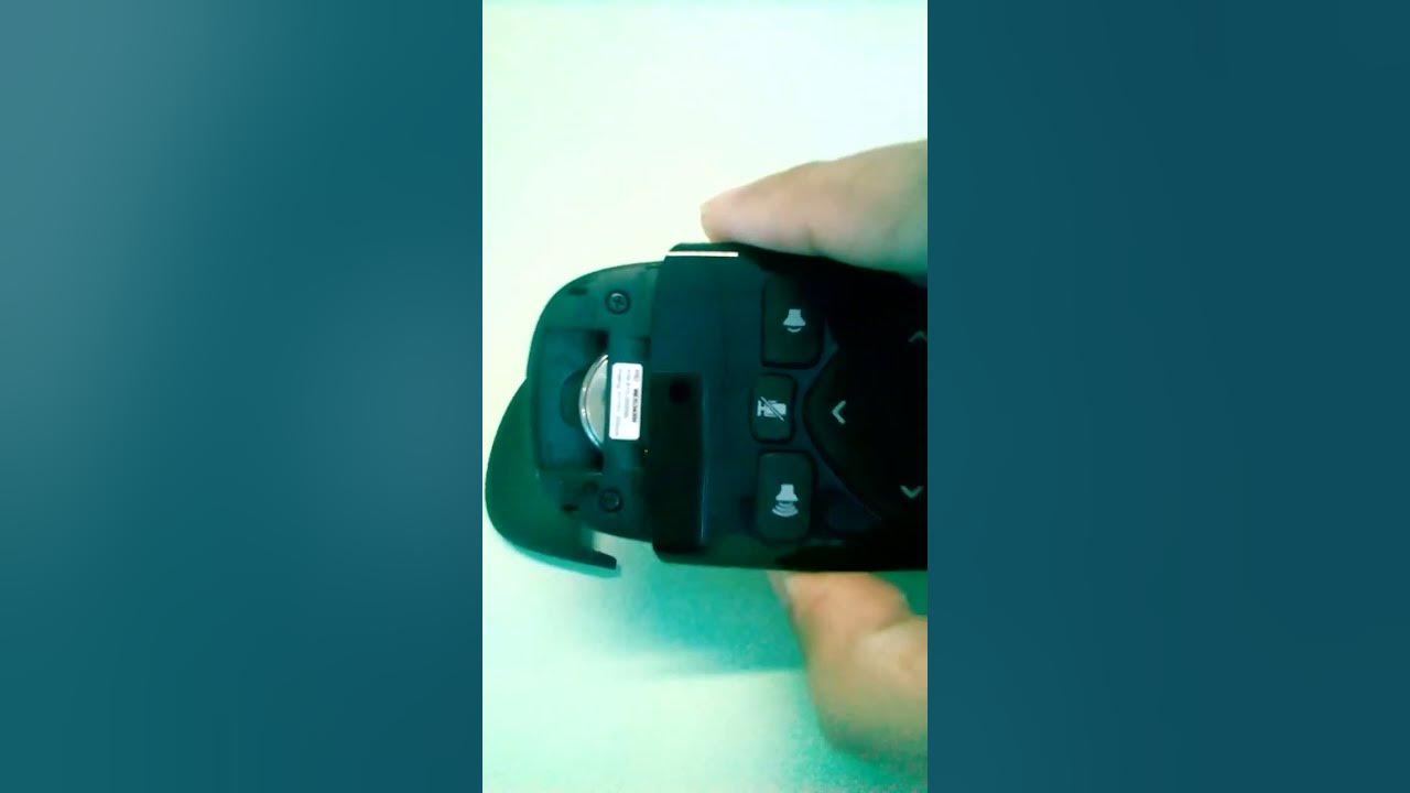 How to open Logitech BCC950 remote to replace the battery it took a
