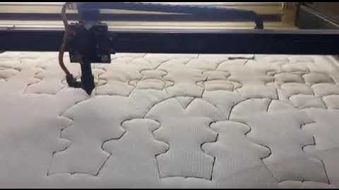 MÁY LASER CẮT VẢI MAY THÚ NHỒI BÔNG