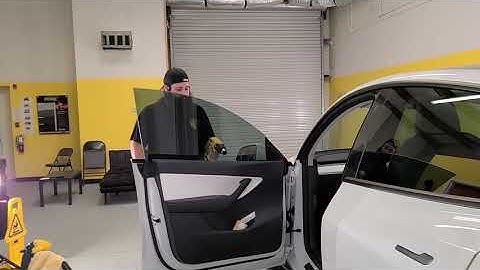 How window tinter deal with windows automatically coming down when the doors are opened on a Tesla