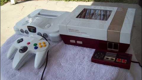 Custom white N64 with blue led and illuminating logo and NES with Famicom colors, viewing window