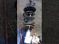 Don't ever remove strut spring this way or you'll DIE!